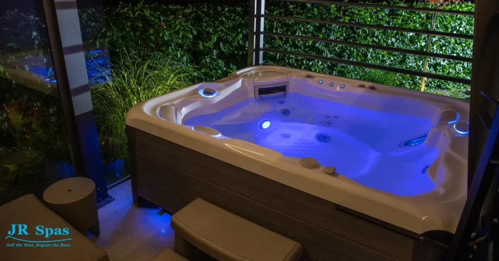 Backyard hot tub privacy ideas with a privacy screen and greenery for privacy and shade
