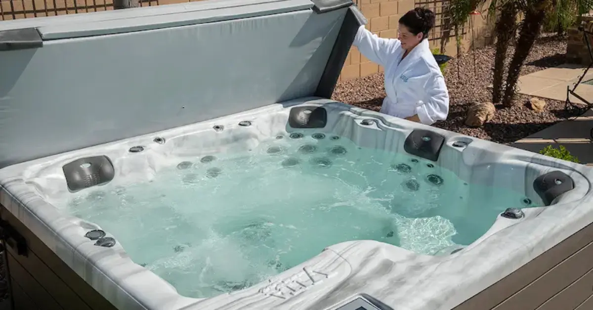 Person opening up their hot tub after buying a hot tub from the Stephenville hot tub store